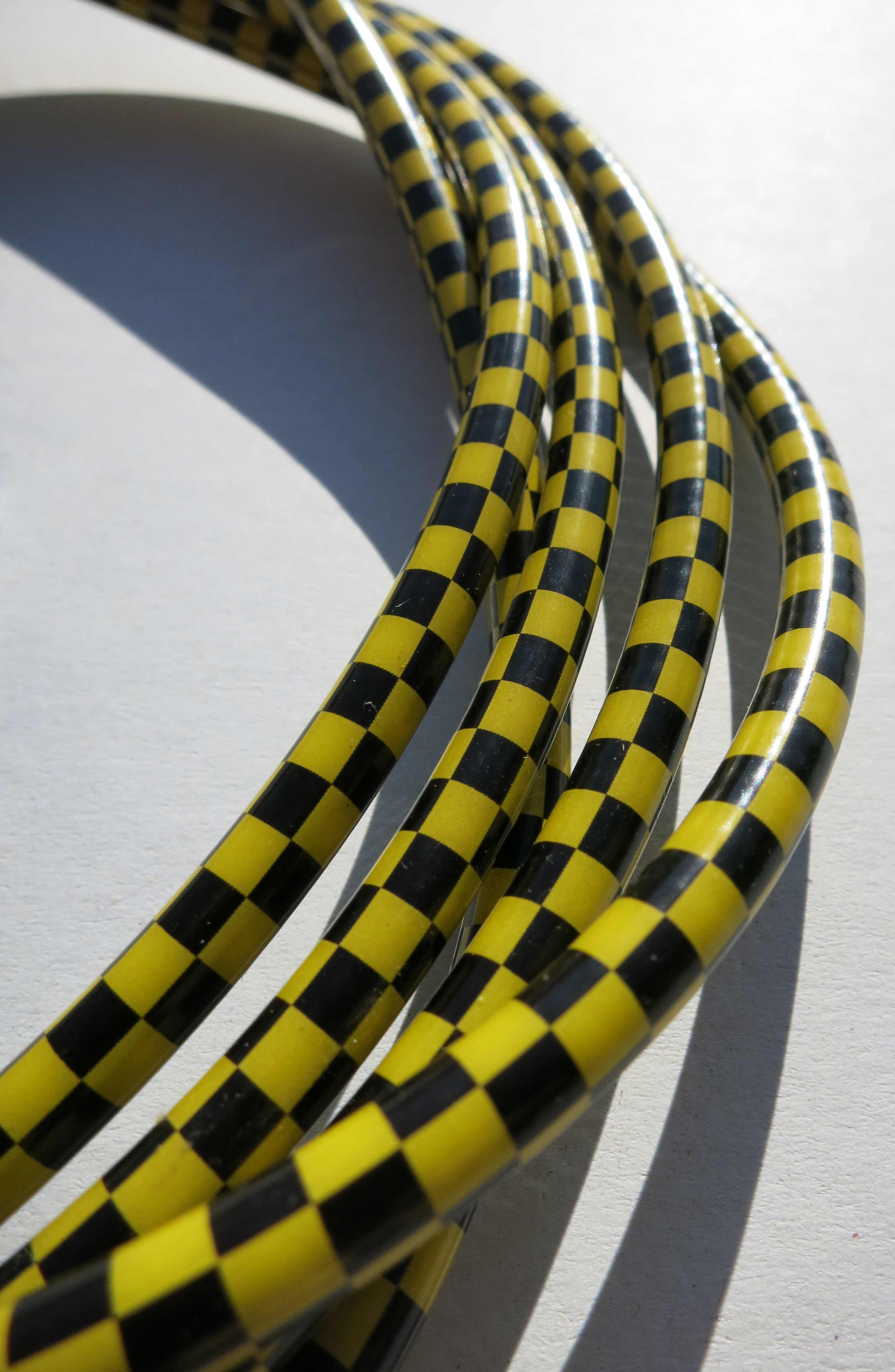 Cable exterior Bowden bandera de cuadros en negro / amarillo