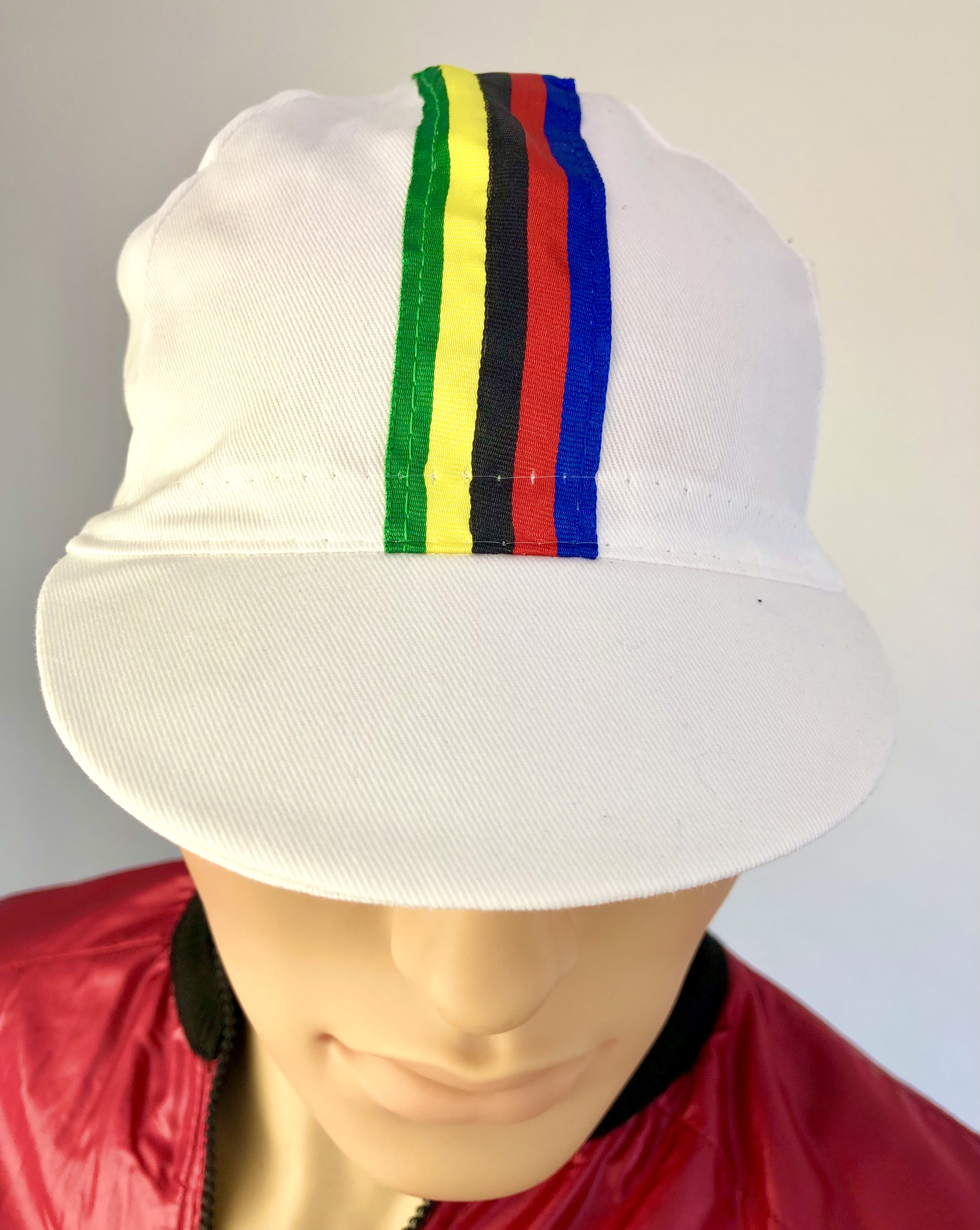 Cycling Cap blanco con rayas de colores