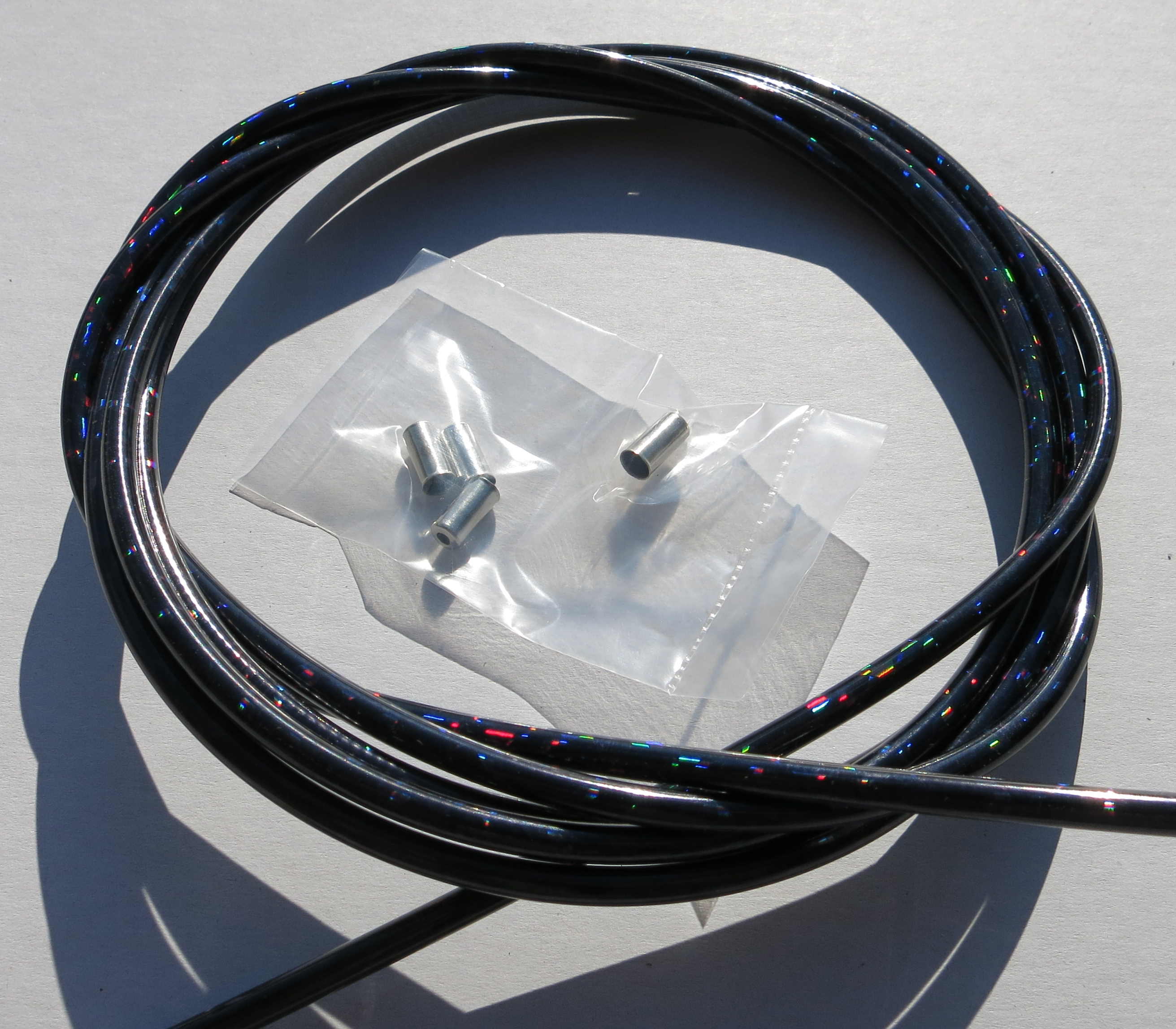 Cable exterior Bowden confeti brillante en negro metalizado
